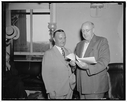 Air Corps Chief before Senate Committee. Washington, D.C., May 24. Maj. Gen. Oscars Westover, (left) Chief of the U.S. Army Air Corps, with Senator Elbert D. Thomas of Utah, Chairman of the Senate Military Affairs Subcommittee now conducting hearings on the Helium gas bill. Gen. Westover is expected
