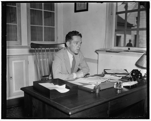 Unidentified man at desk