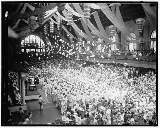 School's out. Annapolis, MD. June 3. School's out for the graduating class at the Naval Academy at Annapolis, after receiving their diplomas the midshipmen are shown getting rid of their midshipmens caps for the headgear of an ensign. 6/3/37