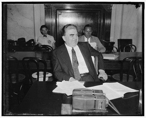 Labor Chief in good humor. Washington, D.C. June 7. Rarely is John L. Lewis ever pictured smiling. But the cameraman caught the C.I.O. Chief in a jovial mood today as he appeared before the Senate and House Labor Committees and the result is this interesting picture. Lewis endorsed the minimum and m