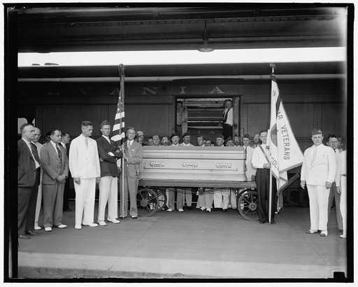 Funeral services for Congressman Connery. Washington, D.C. June 16. The casket of Rep. William Connery, Mass. shown at the Union Station today before entraining for Lynn, Mass. Where funeral services will be held, the Guard of Honor is composed of members of the Yankee Division Club of Washington of