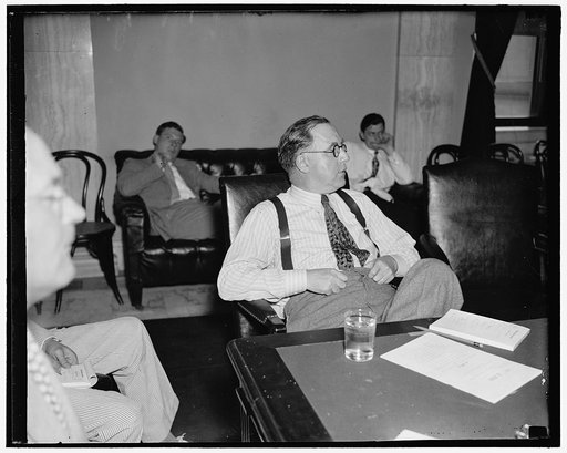 Washington Senator. Washington D.C. June 28. A new informal picture of United States Sentaor Lewis B. Schwellenbach, of Washington, snapped as he attended a meeting of the Senate Agriculture Committee today, 6/28/37