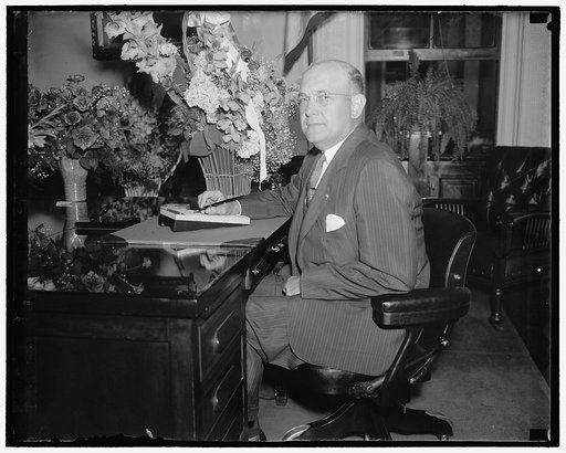 Assumes post as Assistant Secretary of War Washington D.C. June 28. Louis A. Johnson, of Clarksburg, W.VA., photographed at his desk today shortly after taking the oath as assistant secretary of war. He is former National Commander of the American Legion. 6/28/37