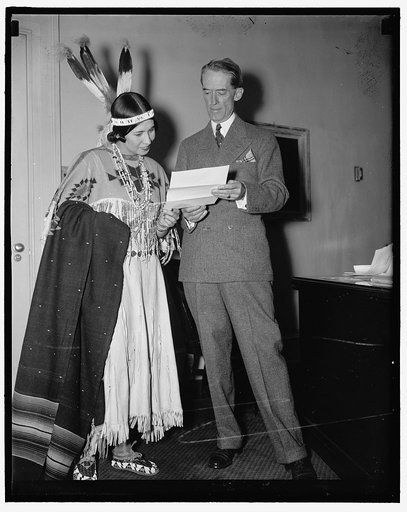 Indian Princess invites President Grand Council Washington D.C. June 28. Dressed in full regalia, Princess White Deer, extended an invitation to President Roosevelt at the White House today to attend the Six Nations Iroquis Grand Indian Council July 5 at St. Regis Reservation. The Princess; who is s