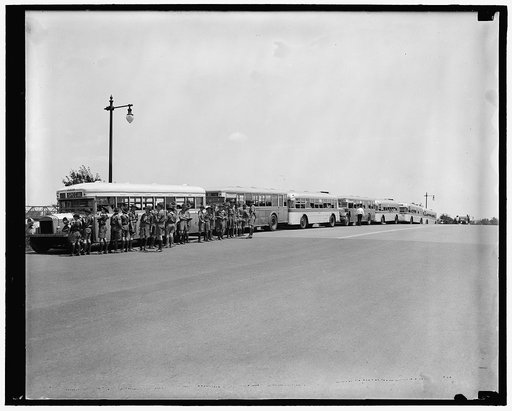 Boy Scouts sightseeing in buses