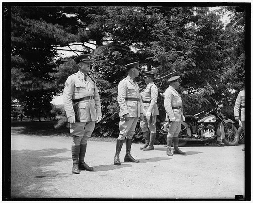 Soldiers guard Dupont home. Wilmington, Del. July 1. A cordon of soldiers aided state troopers in guarding the entrance to Owl's Nest, Dupont estate, as guest arrived for the Roosevelt-Dupont wedding yesterday, 7/1/37