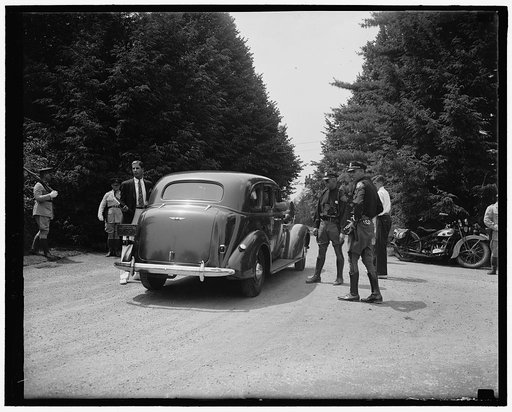 Soldiers guard Dupont home. Wilmington, Del. July 1. A cordon of soldiers aided state troopers in guarding the entrance to Owl's Nest, Dupont estate, as guest arrived for the Roosevelt-Dupont wedding yesterday, 7/1/37
