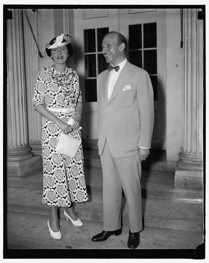 Wife of retiring French Ambassador at White House. Washington D.C. July 12. Mme. Georges Bonnet, wife of the retiring Ambassador, calls at the White House with Jules Henry, Counselor of the Embassy to bid President Roosevelt goodbye before sailing for France. Ambassador Bonnet is already in France a