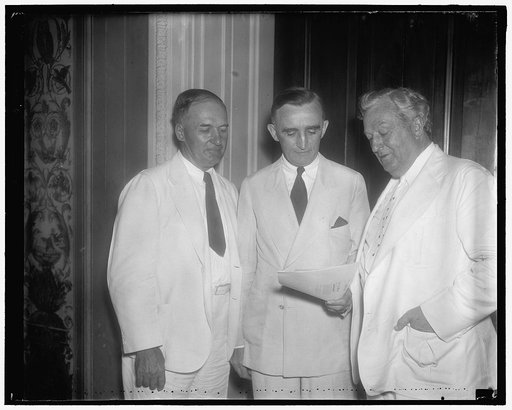 Democratic leaders in fight on court reorgination bill. Washington D.C. July 12. These three senators, Senator Edward R. Burke, (left) of Nebraska; Senator Joseph C. O'Mahoney, Wyoming; Senator Pat McCarran, (right) Nevada, along with Senator Burton K. Wheeler, of Montana, are leading the fight from