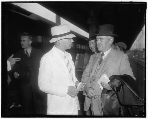 New Zealand Minister of Finance arrives. Washington D.C., July 12. Walter Nash, Minister of Finance, Customs, and Marketing of New Zealand, as he [was] greeted on his arrival today by H.O. Chalkley, (left) Counselor of the British Embassy. Mr. Nash, accompanied by a party of technical commercial aid
