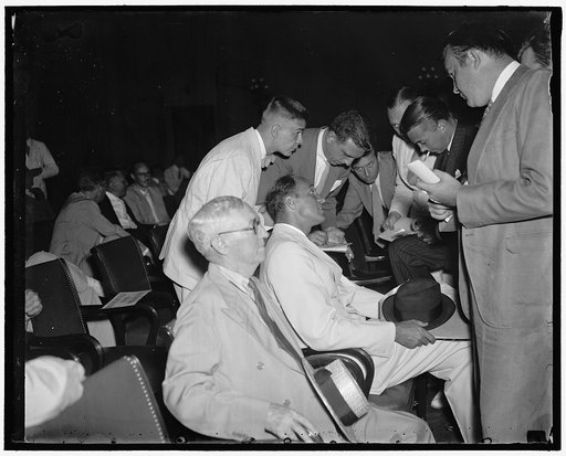Son of President Roosevelt before Tax Evasion Committee. Washington D.C., July 13. James Roosevelt, son and Secretary of President Roosevelt, who appeared before the Join Congressional Tax Evasion Committee today to deny "emphatically" assertions by Rep. Hamilton Fish, R. of New York that he has use