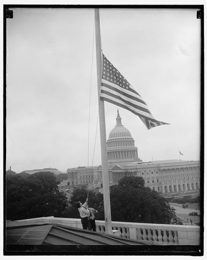 Out of respect to dead Senate Majority Leader. Washington D.C., July 14. The flag atop the Senate office building is lowered to half mast out of respect to Senate Majority Leader Joseph T. Robinson who died this morning at his apartment within a stones throw of the Capitol, 7/14/37