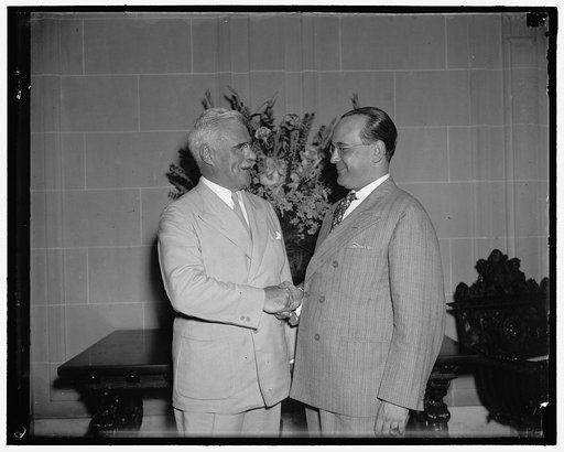 New U.S. envoy to Cuba guest of Cuban Ambassador. Washington D.C., July 15. J. Butler Wright, new U.S. Ambassador to Cuba, is greeted by Senor Dr. Pedro Martinez Fraga, Cuban Ambassador, as he arrived at the Cuban Embassy where he was guest at luncheon today, 7/15/37
