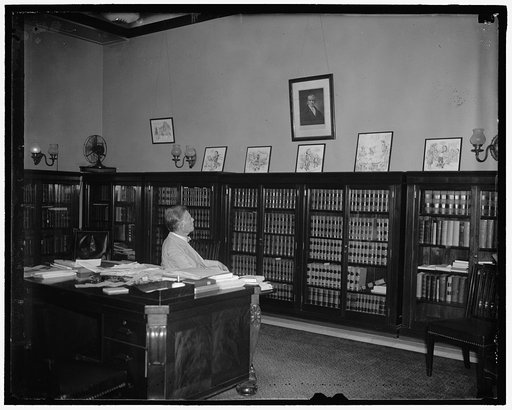 Veteran Idaho legislator. Washington D.C. July 16. Senator William E. Borah, veteran Senator from Idaho, photographed in his office today. A great admirer of the late John Marshall, first Chief Justice of the United States Supreme Court, Senator Borah is shown gazing at a picture of the jurist which