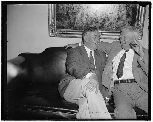 New majority leader and Vice President. Washington D.C., July 21. The new majority leader of the Senate Senator Alben Barkley of Kentucky has his first official session with the Vice President after being elected by a vote of 38 to 37 over Sen. Pat Harrison of Miss. Barkley, left; will take over the