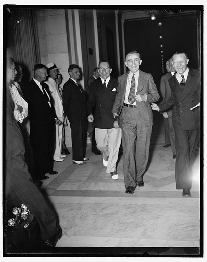 Court plan opponent. Washington D.C., July 22. Once the faired-haired boy at the White House, Senator Joseph C. O'Mahoney of Wyoming, is now bitterly opposing the President's Court Reorganization plan. He is shown leaving the extraordinary meeting of the Senate Judiciary Committee today, 7/22/37