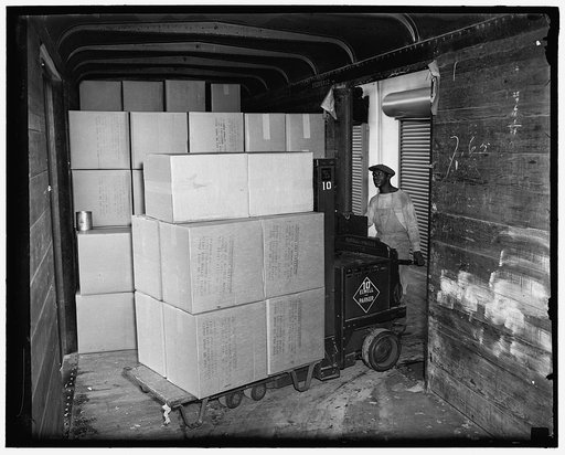 Unloading supplies at Treasury procurement, 7th and D sts, S.W.