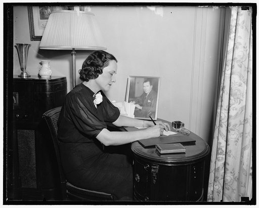 Washington D.C. July 27. Mrs. Claude Pepper, Wife of the Senator from Florida, doing her own secretarial work accepts an invitation to a social affair, 7/27/37