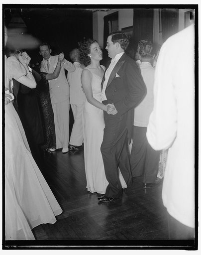 Holts out dancing. Washington, D.C., July 30. Senator Rush Holt, Democrat of West Virginia, dances with his pretty sister Jane, as they attended a reception last night given by the Egyptian Legation to herald the coronation of His Majesty King Farouk 1. Announcement has just been made of the engagem
