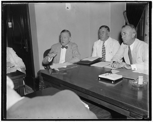 Reorganization hearing, Washington, D.C., Aug 2. New Chairman of the president's reorganization committee hears arguments for and against the president's plan, left to right: Senate Minority Leader Charles McNary of Oregan, Senate Majority Leader Albin Barkley of KY, and the new Chairman of the Comm