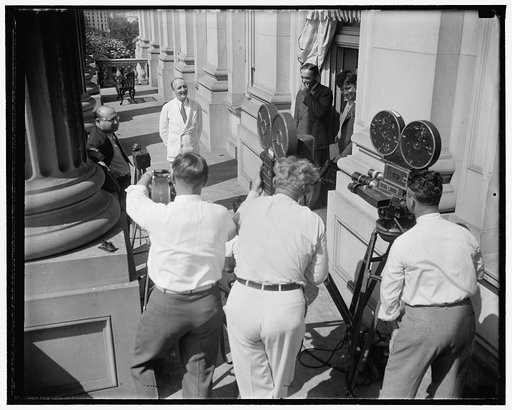 Supreme Court appointee faces movie cameras. Washington, D.C. Aug. 12. Shortly after he was nominated as a member of the United States Supreme Court today, Senator Hugo L. Black of Alabama, faced a battery of ground cameras on the steps of the Capitol. During the next few days the face of the new Ju