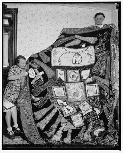 Famous historical quilt. Washington, D.C., Aug. 17. Joseph's coat of many colors had nothing on this unique quilt which is now being completed by Mrs. Ethel Sampson of Evanston, Ill., after six years of collecting. Parts of wearing apparel from President Roosevelt, Mrs. Roosevelt, members of the Cab