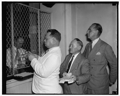 Buying tickets at Capitol, left to right: Maury Maverick, Tex.; Knute Hill, Wash; John M. Huston