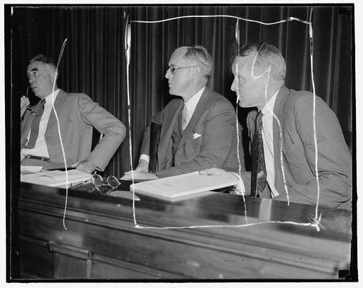 Listen to maritime troubles. Washington, D.C. Aug. 23. Chairman Joseph P. Kennedy, (left) and Commissioner Emory S. Land listen intently as maritime labor chiefs testify at the initial hearing of the U.S. Maritime Commission today in efforts to determine methods to avoid costly industrial labor disp