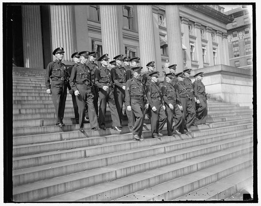 U.S. Treasury guards blossom out in new uniforms. Washington, D.C. Aug. 26. The first act of the U.S. Secret Service when they were g even supervision of the Treasury Guards was to outfit the men with new uniforms. A neat summer uniform of blue shirt with blue trousers and Sam Browne belt was taken 