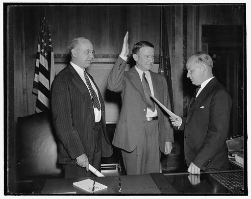 Former member of Social Security Board takes new post in Department of Justice. Washington, D.C., Aug. 30. Vincent M. Miles, whose term as a member of the Social Security Board [...]ired on August 13, was today sworn in as a Special Assistant to Attorney General Cummings. In the photograph, left to 