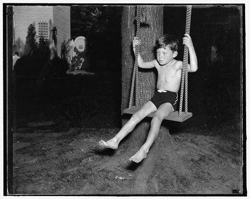 Five year old Tyler Abell, whose custody has been the subject of international litigation, returned to his Washington home today, with his mother and stepfather, Mr. and Mrs. Drew Pearson. Not at all worried, Tyler has a great time playing in the garden of the Pearson Washington home. 9/3/37
