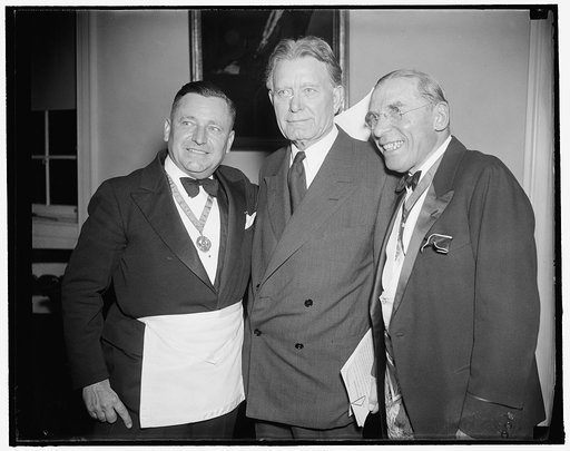 Masons parade for sesquicentennial. Grand Master Paul B. Cromelin; Senator William E. Borah, Idaho; Rep. Sol Bloom, New York