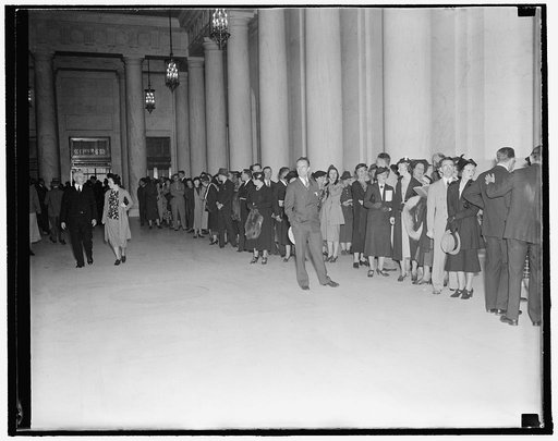 Waiting to enter Supreme Court chamber. Washington, D.C., Oct. 4. A crowd gathered in the Supreme Court Building as early as 8 A.M. today waiting for a chance to enter the court chamber and witness the swearing in of Justice Hugo L. Black. 10/4/37