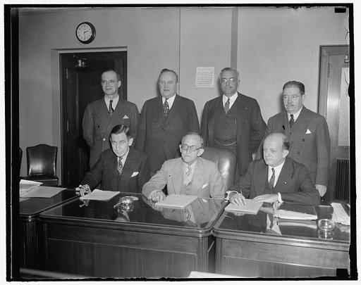 Federal Communications Commission. Washington, D.C., Oct. 6. A new picture of the Federal Comm. Commission, headed by the new Chairman Frank McNinch, formerly Chairman of the Federal Power Commission; left to right, seated: Eugene O. Sykes, Frank McNinch, Chairman Paul A. Walker, standing; left to r