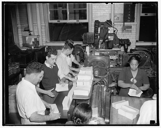 Unemployment census blanks prepared for mailing. Washington, D.C., Oct. 7. As rapidly as the presses in the Government Printing Office print the unemployment census blanks, workers trim and prepare them for mailing. 3,000,000 of the cards are printed daily as the pressmen keep the huge presses runni
