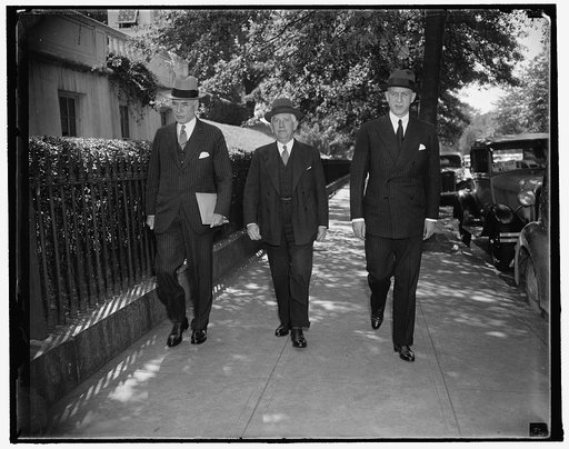 Big three on U.S. Foreign relations. Washington, D.C., Oct. 8. President Roosevelt's first act on his return to the Capital today was to call his Chief Foreign Relations advisors into a conference for a discussion of the International Situation. The big three are shown as they left the White House. 
