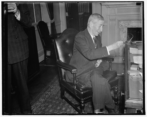 Secretary of Navy. Washington, D.C., Oct. 15. Fully recovered from his serious illness of last year, Secretary of the Navy Claude A. Swanson seems to be in the best of health again. This informal picture was made shortly after the Secretary presented a medal to Rear Admiral Richard E. Byrd today. 10