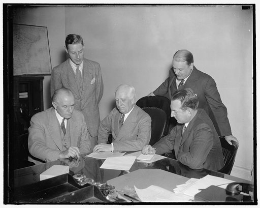 Will represent U.S. at nine power treaty conference in Brussels. Washington, D.C., Oct. 18. The United States Delegates to the Conference of Nine-Power Treaty Signatories [...] Brussels held their first meeting at the state [...] today to discuss preliminary arrangements. In the photograph, left to 