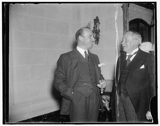 International rotary head luncheon at French Embassy. Washington, D.C., Oct. 19. In the Capital to attend a round of fetes celebrating the 25th anniversary of the Washington Rotary club, Maurice Duperrey of Paris, (right) was a luncheon guest of Jules Henry, Counselor and Charge D'affaires of the Fr