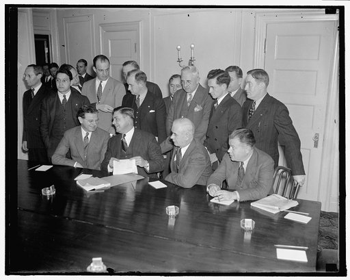 A.F. of L. and C.I.O. start peace conferences. Washington, D.C., Oct. 25. Labor leaders named by the CIO and A.F. of L. to attempt to find a basis for peace between the two warring factions of organized labor are sown here at the opening of the Peace Parley at the Willard Hotel here today. Seated, l