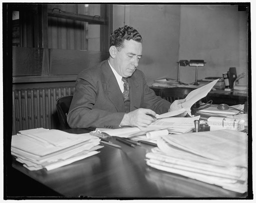 Scalp [?] demanded by seaman's union. Washington, D.C., Oct. 26. The ouster of Dan S. Ring, (above) personnel officer of the Maritime Commission, and Joseph P. Kennedy, Chairman, has been demanded in a resolution sent President Roosevelt by the Baltimore Branch of the National Maritime Union. The de