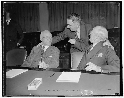 Last-minute huddle. Washington, D.C., Nov. 4. The House Ways and Means Sub-Committee today began consideration of a general revision of the Federal Revenue Structure. Today's session which was executive was devoted chiefly to the discussion of procedure. In the photograph, left to right: Rep. Allen 