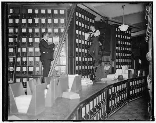 Capitol document room. Washington, D.C., Nov. 9. Scene in the document room at the Capitol today as clerks cleared the decks for the many bills which will introduced during the special session of Congress convening November 15. All bills are kept on file in the document room. 11/9/37