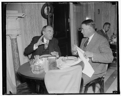 Senate and house leaders together. Washington, D.C., Nov. 13. Speaker of the House William B. Bankhead, (left) and Senator Alvin W. Barkley, Senate Majority Leader, discuss plans from the Democratic viewpoint for the special session as they lunch in the Capitol restaurant. Speaker Bankhead seemed to