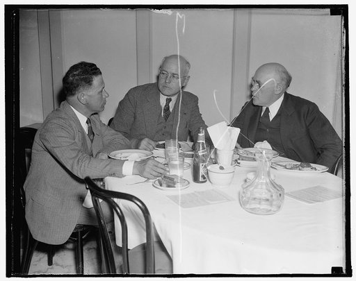 "Just before the battle, mother." Washington, D.C., Nov. 13. Members of the Senate Agricultural Committee meet in the Senate restaurant to talk over the coming Farm Legislation before the opening of Congress Monday, left to right: Sen. Allen Ellender, La. Sen.; Jame Pope, Idaho; Sen. John H. Bankhea