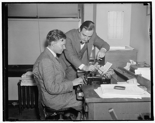 Robert Kit[...] at typewriter. Joseph Alsop made for Hartford Courant, 11/15/37