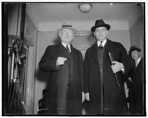 A.F. of L. leaders arrive. Washington, D.C., Dec. 2. A.F. of L. President William Green with his Chief Lieutenant George M. Harrison, arriving at the Willard Hotel today for the meeting with John L. Lewis at which efforts for a truce or permanent peace will be sought, 12/2/37
