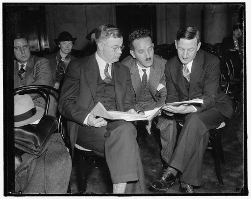 Senate committee hears NLRB chairman. Washington, D.C., Dec. 13. Chairman of the National Labor Relations Board, J. Warren Madden told the Senate Commerce Committee today he was doubtful that principles of the railway labor act could be applied successfully to the Maritime Industry. Chairman Madden 