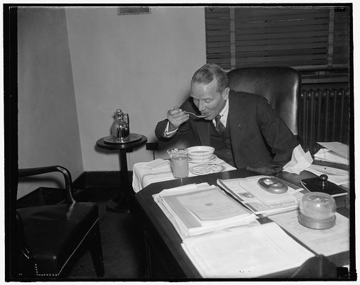 Acting maritime head busy official. Washington, D.C., Dec. 20. So busy these days is Admiral Emory S. Land, acting Head of the U.S. Maritime Commission, that he generally has lunch served at his desk every day. Land is pinch-hitting for Chairman Joseph P. Kennedy who vacationing in Florida. Reports 