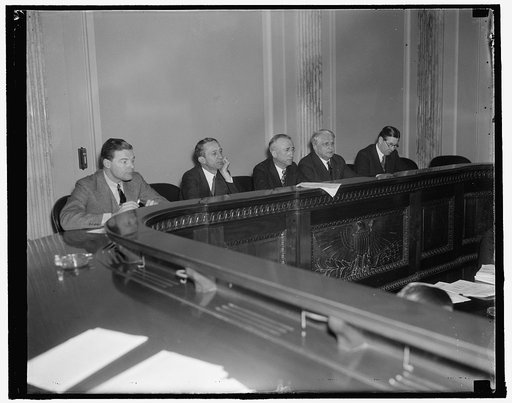 Senate committee studying unemployment. Washington, D.C., Jan. 4. Headed by Senator James F. Byrnes, of South Carolina, members of the special committee studying unemployment listen to Isador Lubin, Chief of the Bureau of Labor Statistics, describe a drop of 1,500,000 in employment from October to D
